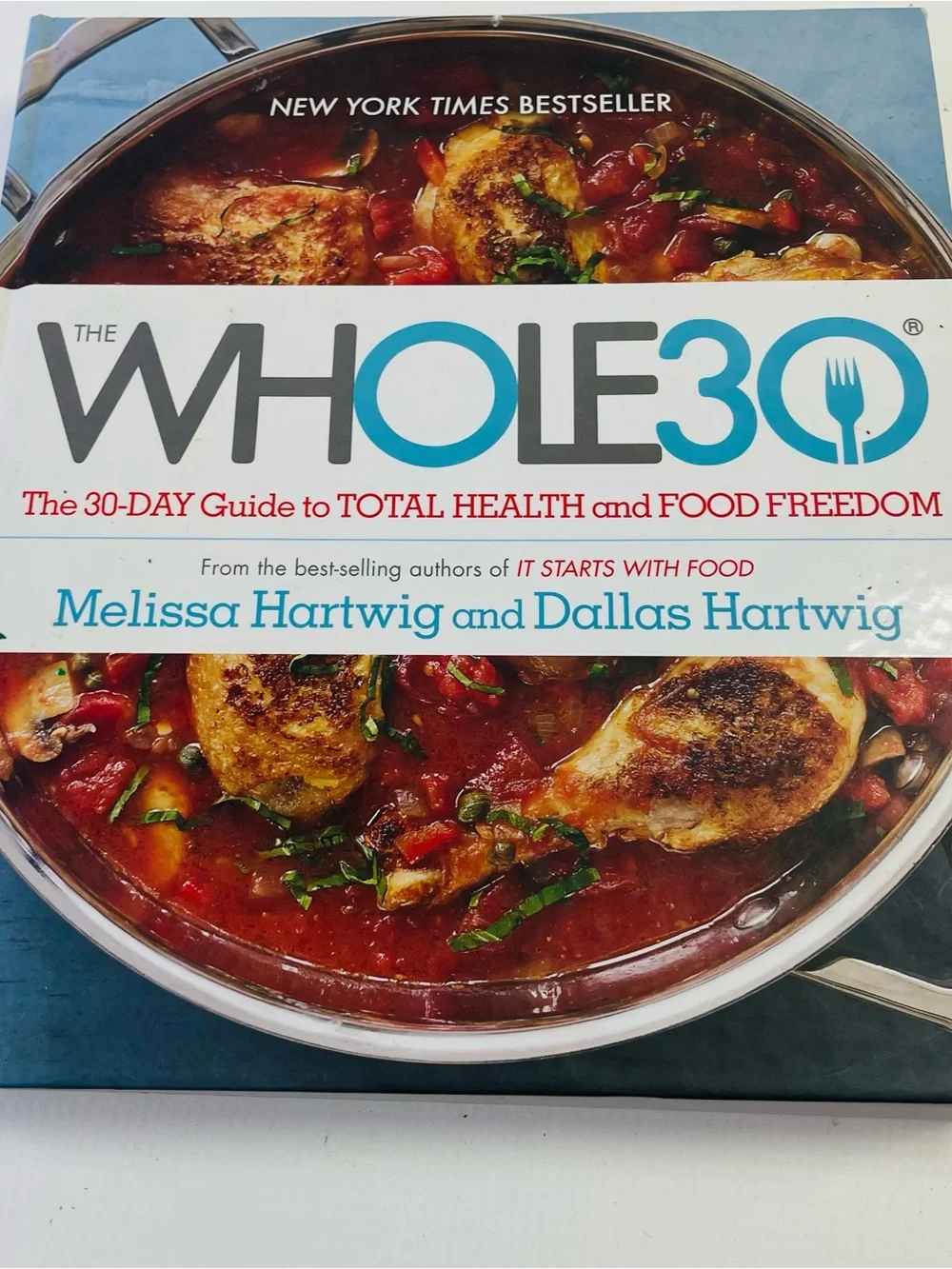 Cookbook by Melissa Hartwig and Dallas Hartwig - White and Blue Cover